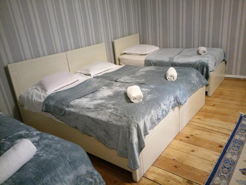 Postel nebo postele na pokoji v ubytování Abramichi Guest House