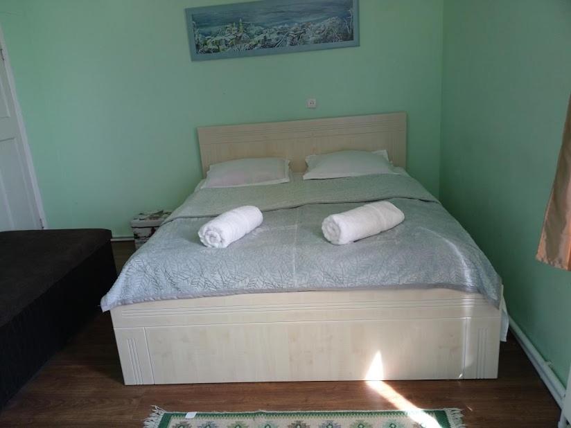 Postel nebo postele na pokoji v ubytování Abramichi Guest House
