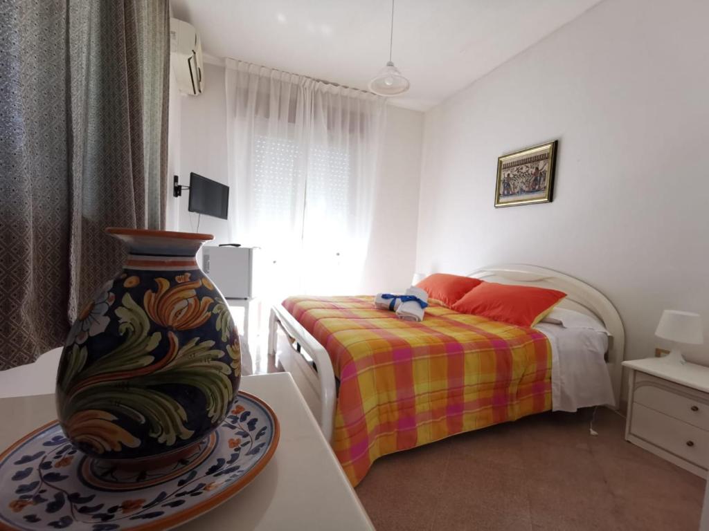 Postel nebo postele na pokoji v ubytování Villa Midolo