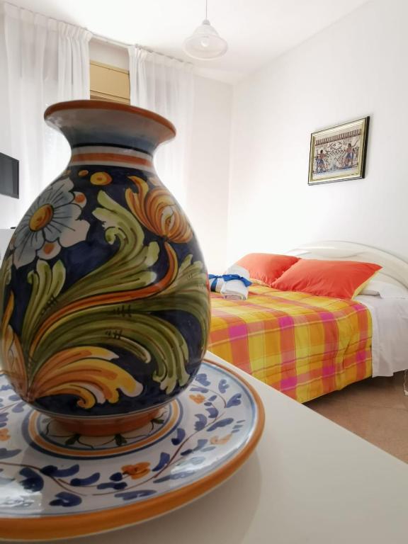 Postel nebo postele na pokoji v ubytování Villa Midolo