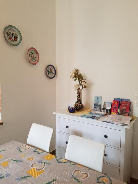 Łóżko lub łóżka w pokoju w obiekcie Casa di Chiara
