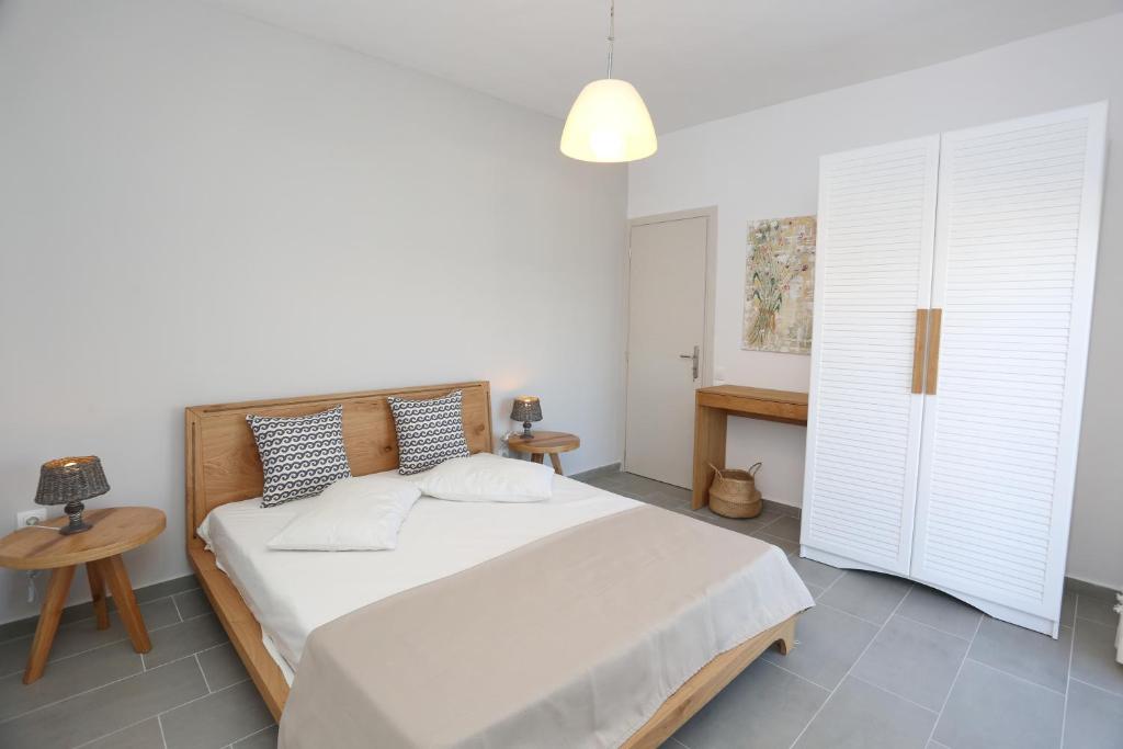 Postel nebo postele na pokoji v ubytování BleVista Apartments