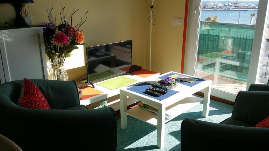 Posedenie v ubytovaní Apartamentos Ferrán Paqui