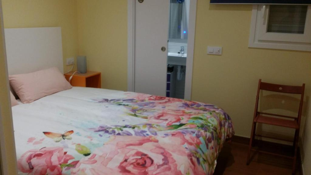 Posteľ alebo postele v izbe v ubytovaní Apartamentos Ferrán Paqui