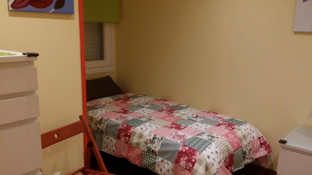 Posteľ alebo postele v izbe v ubytovaní Apartamentos Ferrán Paqui