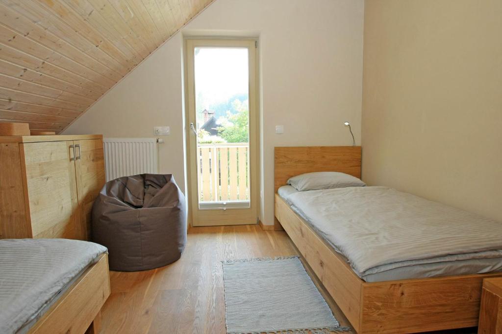 Postel nebo postele na pokoji v ubytování Apartma - Počitniška hiša Lodi