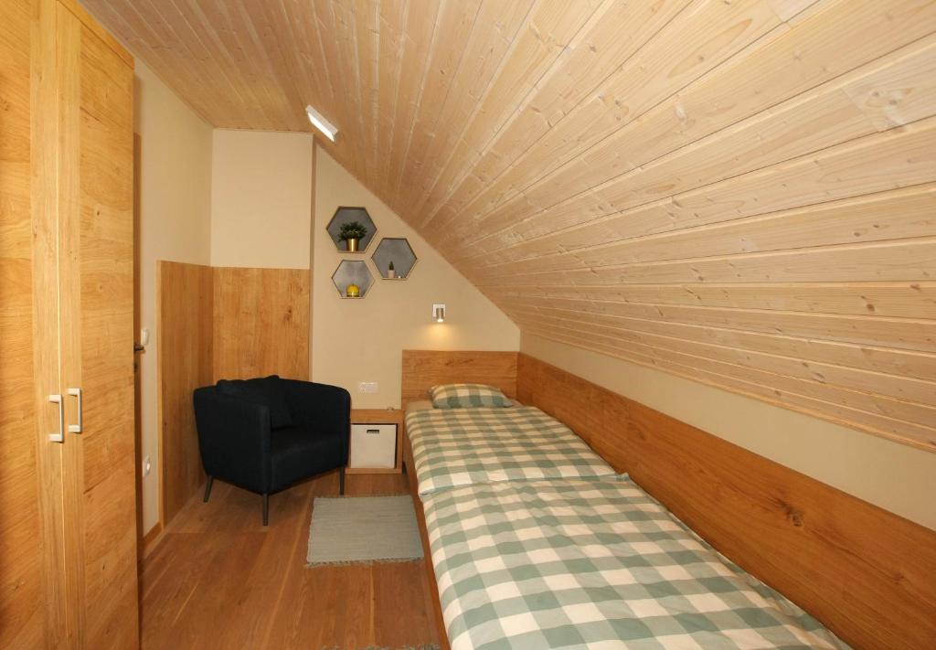 Postel nebo postele na pokoji v ubytování Apartma - Počitniška hiša Lodi