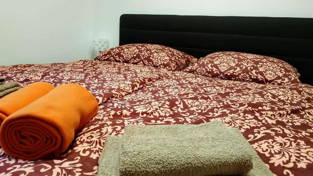 Postel nebo postele na pokoji v ubytování Bílá hora Štramberk