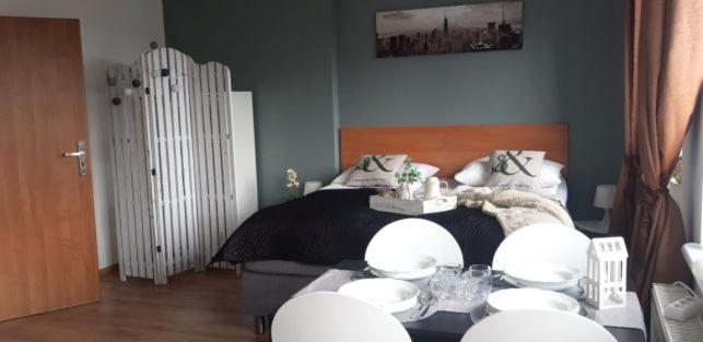Postel nebo postele na pokoji v ubytování Azalia 32 Mielno l