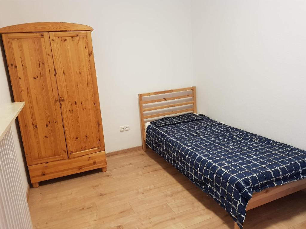 Postel nebo postele na pokoji v ubytování Vermietung-Maintal