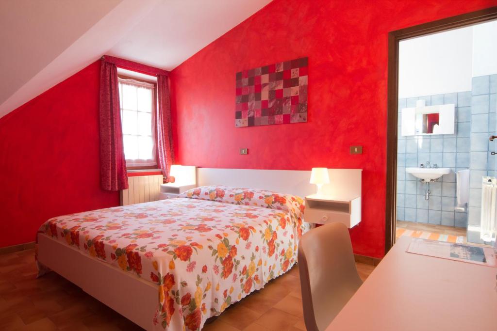 Postel nebo postele na pokoji v ubytování Hotel Edelweiss