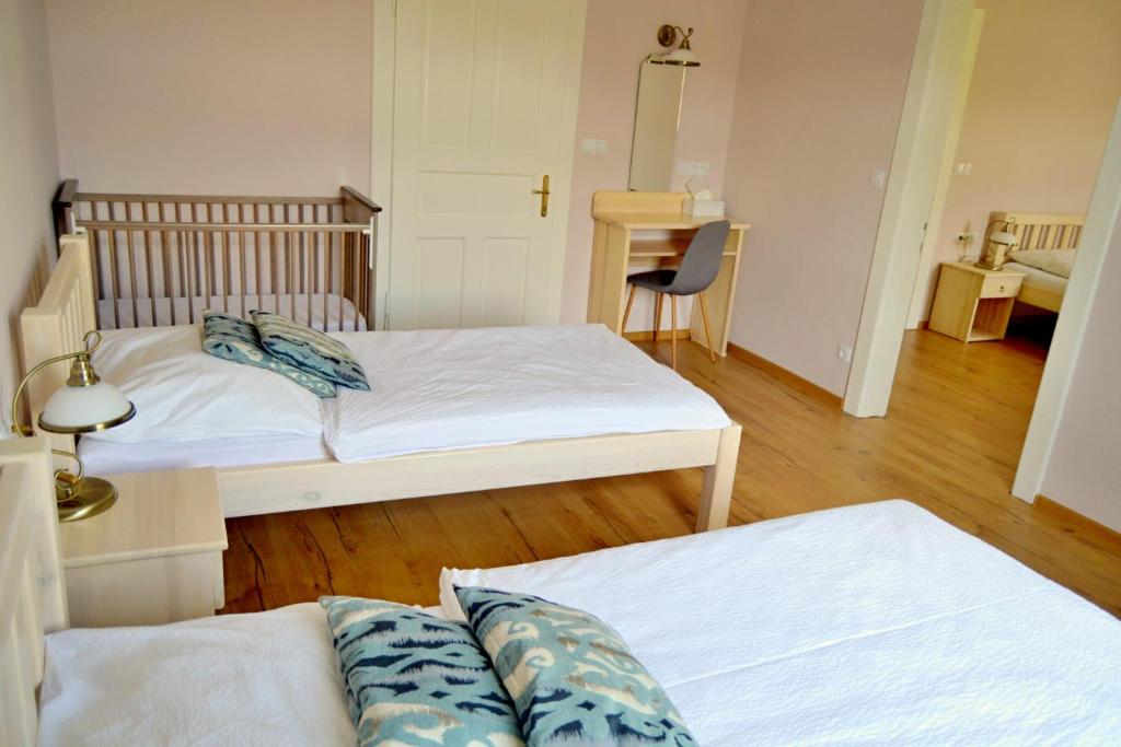 Postel nebo postele na pokoji v ubytování Villa Harmony
