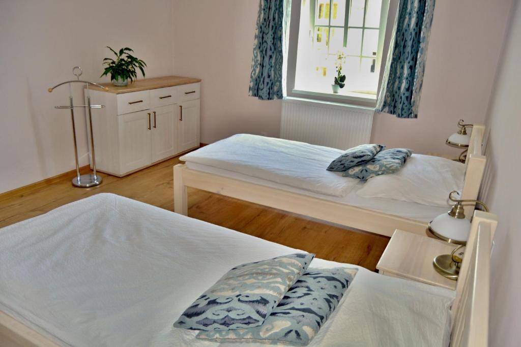 Postel nebo postele na pokoji v ubytování Villa Harmony