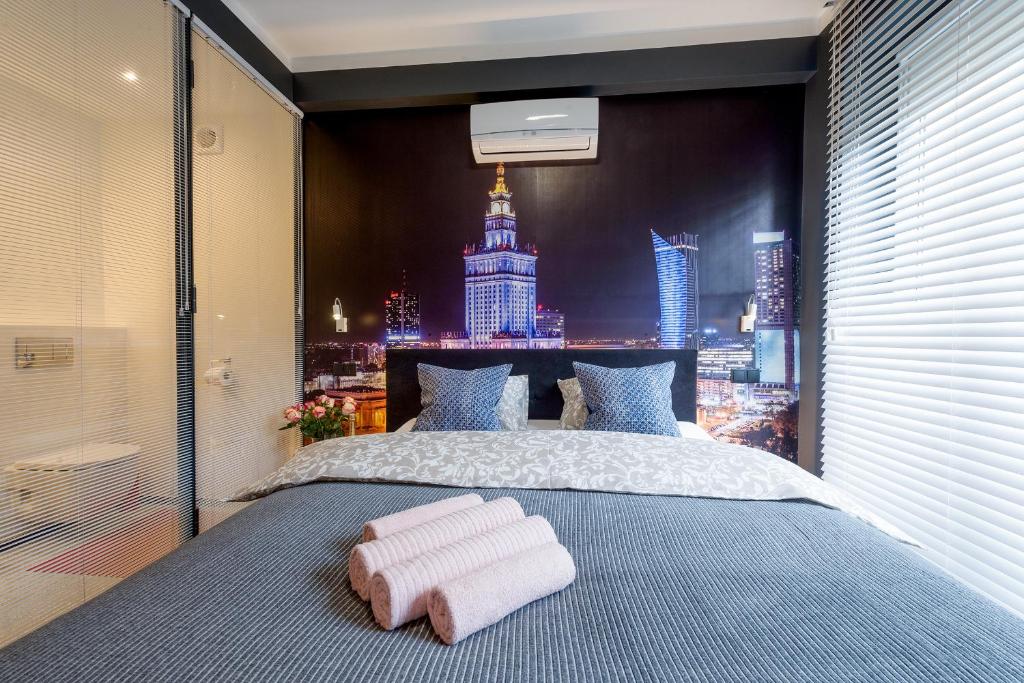 Posteľ alebo postele v izbe v ubytovaní My Beloved Warsaw