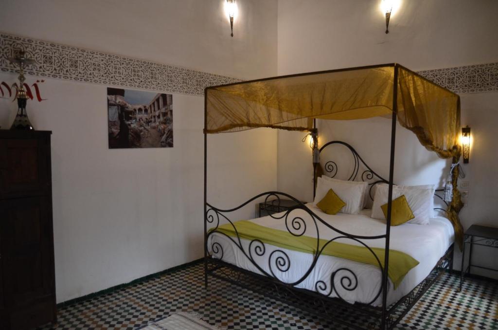 Postel nebo postele na pokoji v ubytování Riad Jamaï