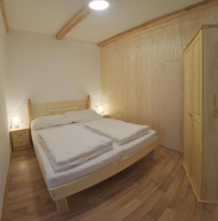 Postel nebo postele na pokoji v ubytování Blatský dvůr