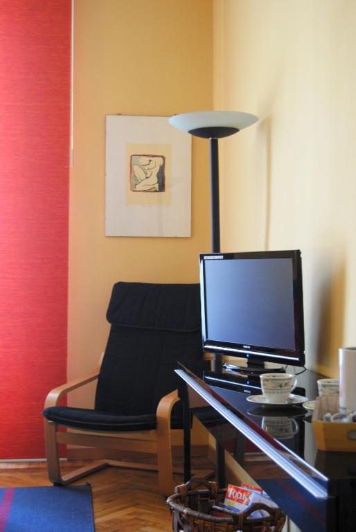 TV a/nebo společenská místnost v ubytování Alma Clara B&B