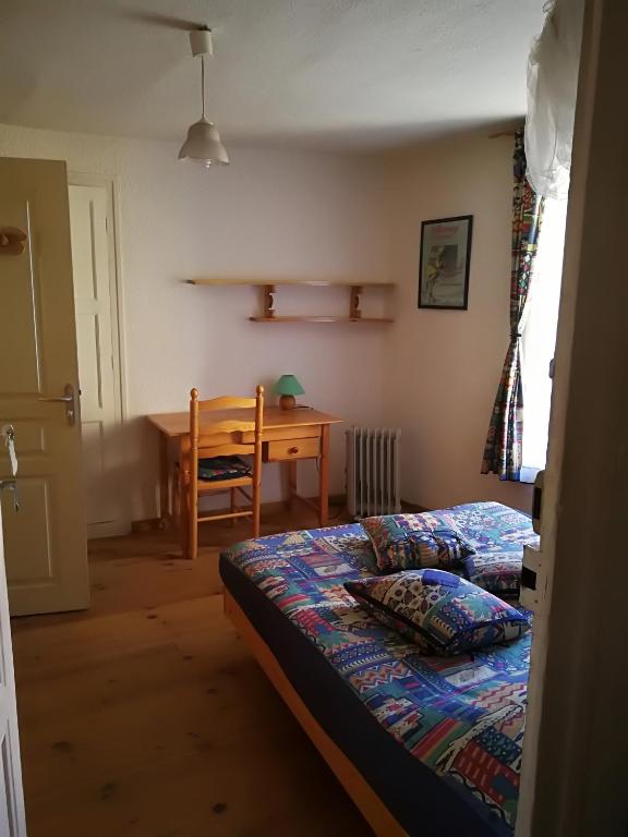Postel nebo postele na pokoji v ubytování Mini-Hôtel de Camps