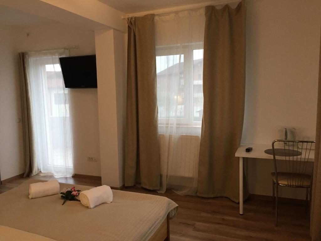 Postel nebo postele na pokoji v ubytování Top Style Villa