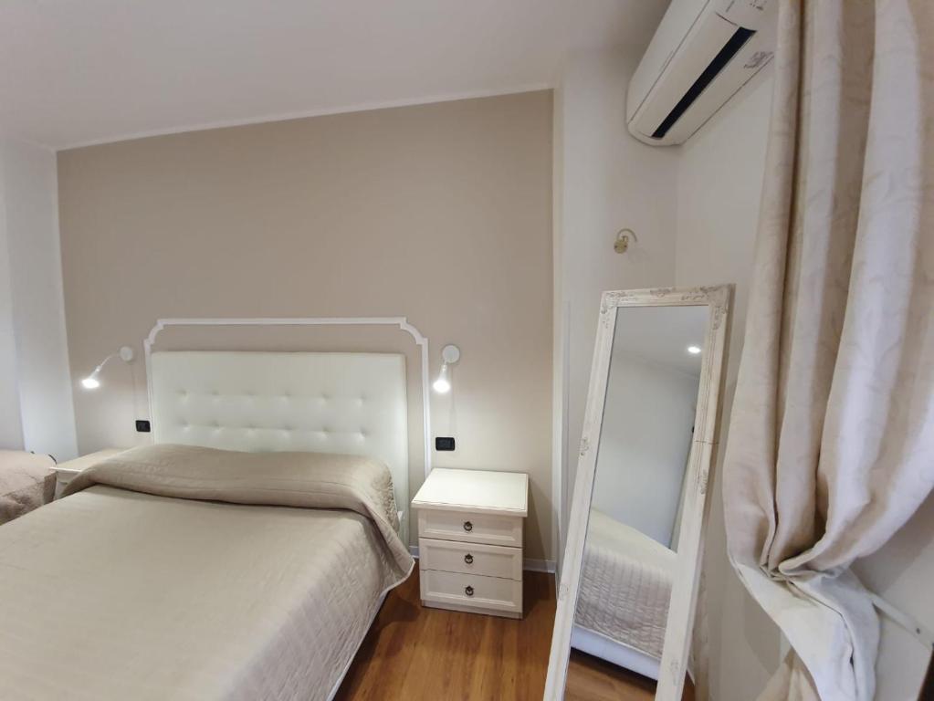 Postel nebo postele na pokoji v ubytování Guest House Piazza Carmine