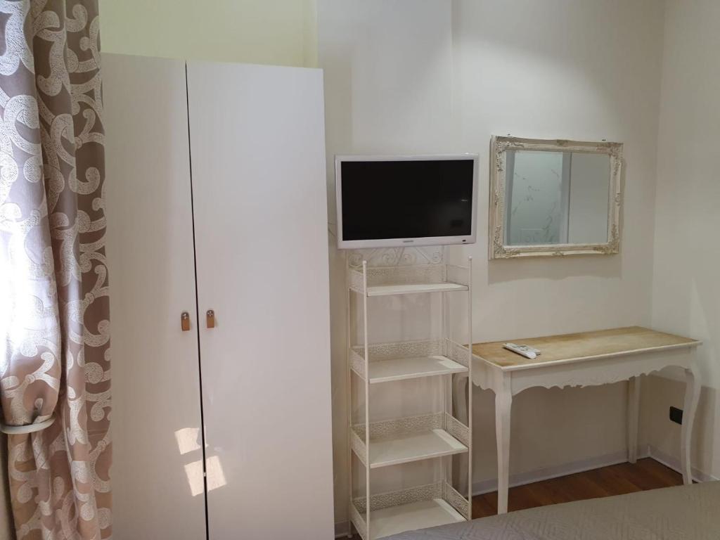 TV a/nebo společenská místnost v ubytování Guest House Piazza Carmine
