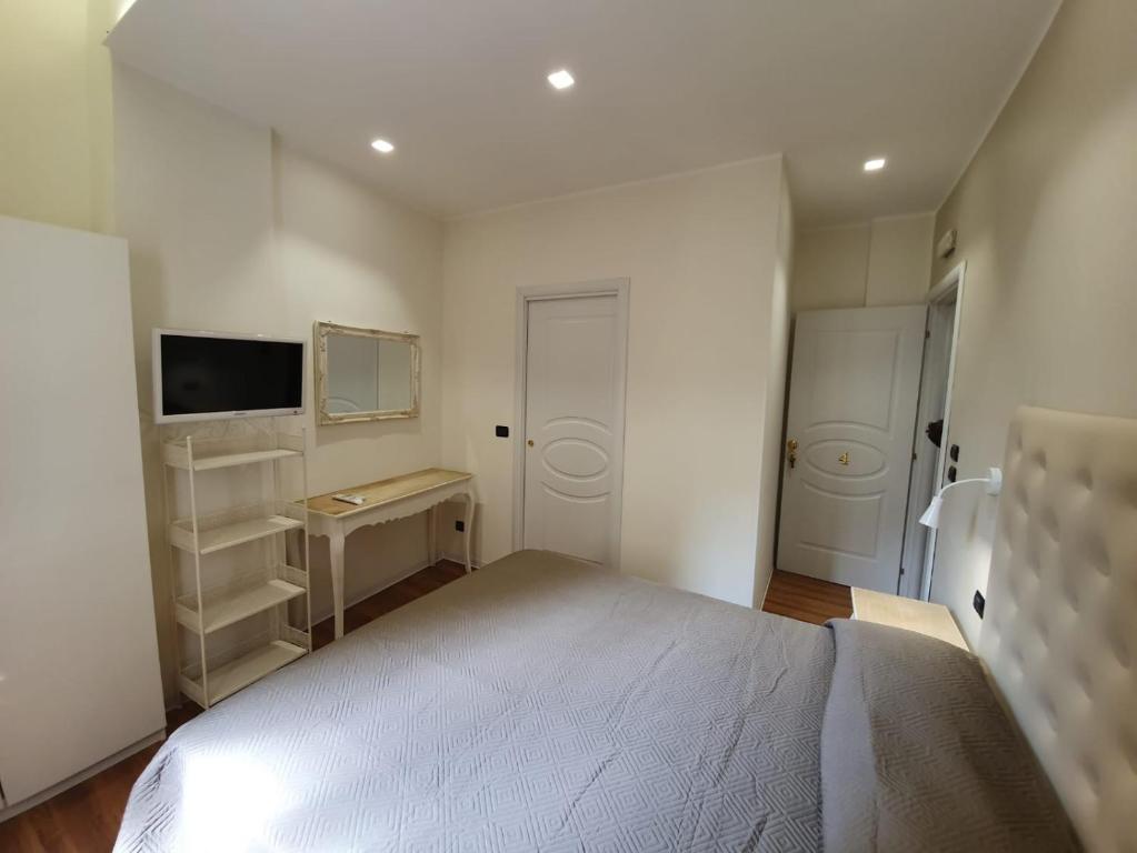 Postel nebo postele na pokoji v ubytování Guest House Piazza Carmine