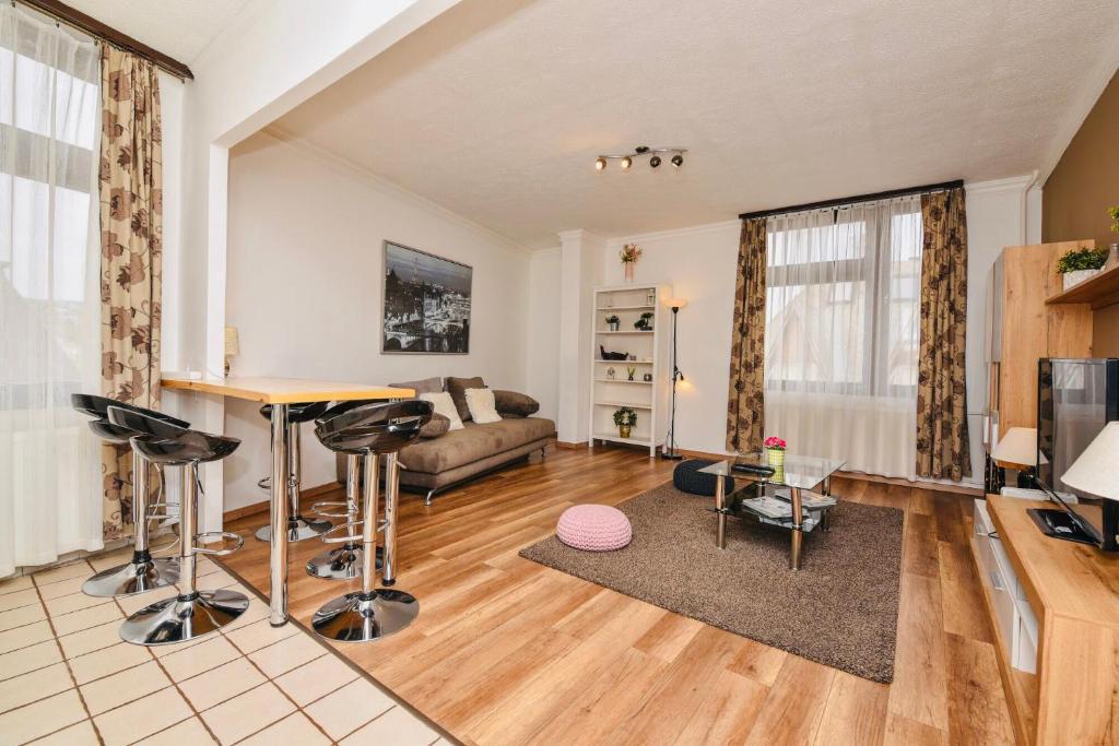 Televízia a/alebo spoločenská miestnosť v ubytovaní Mammut Apartment with NEW AC!