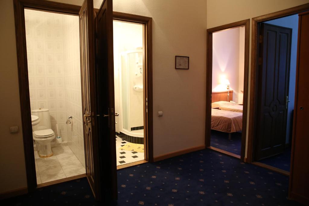 Postel nebo postele na pokoji v ubytování Araks Hotel Complex