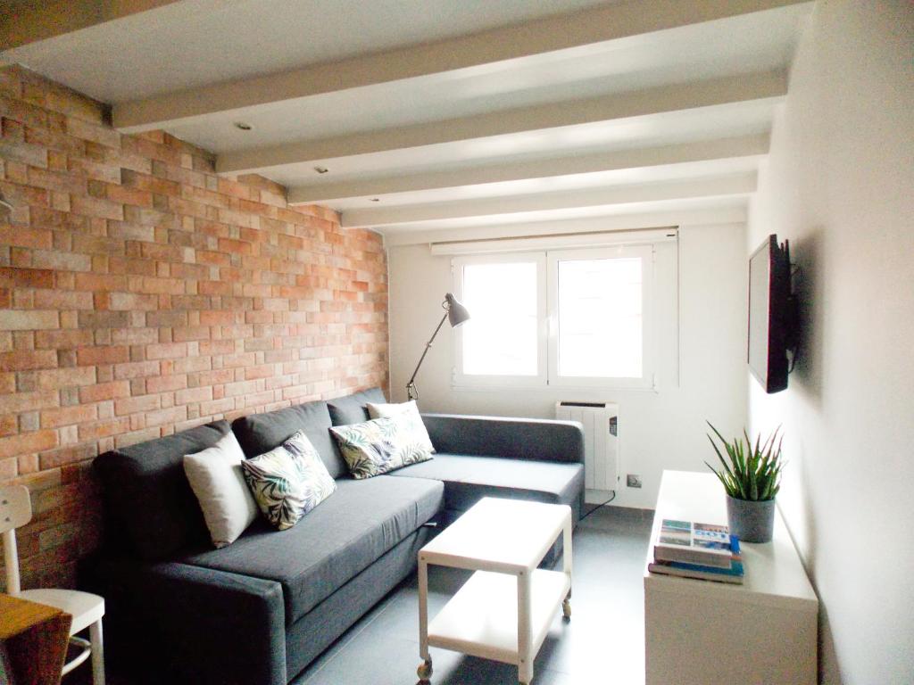 A seating area at Apartamento Sanxenxo Centro