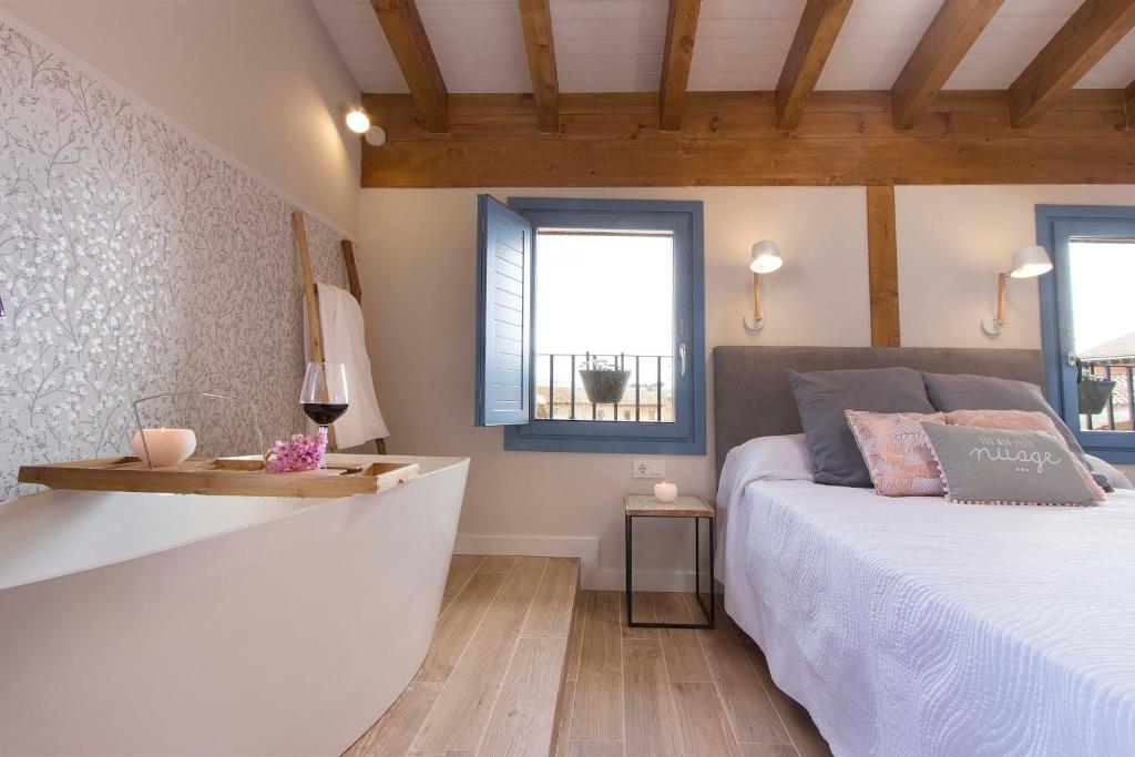 A bed or beds in a room at El Mirador de Eloísa