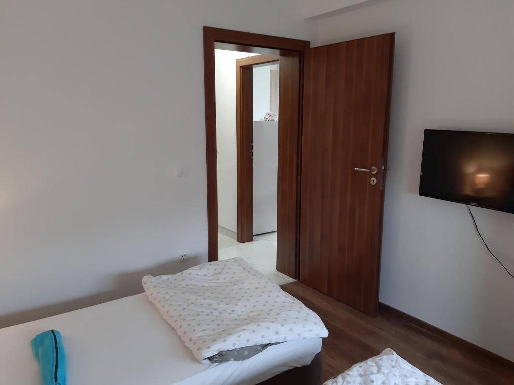 Postel nebo postele na pokoji v ubytování Villa Piccola