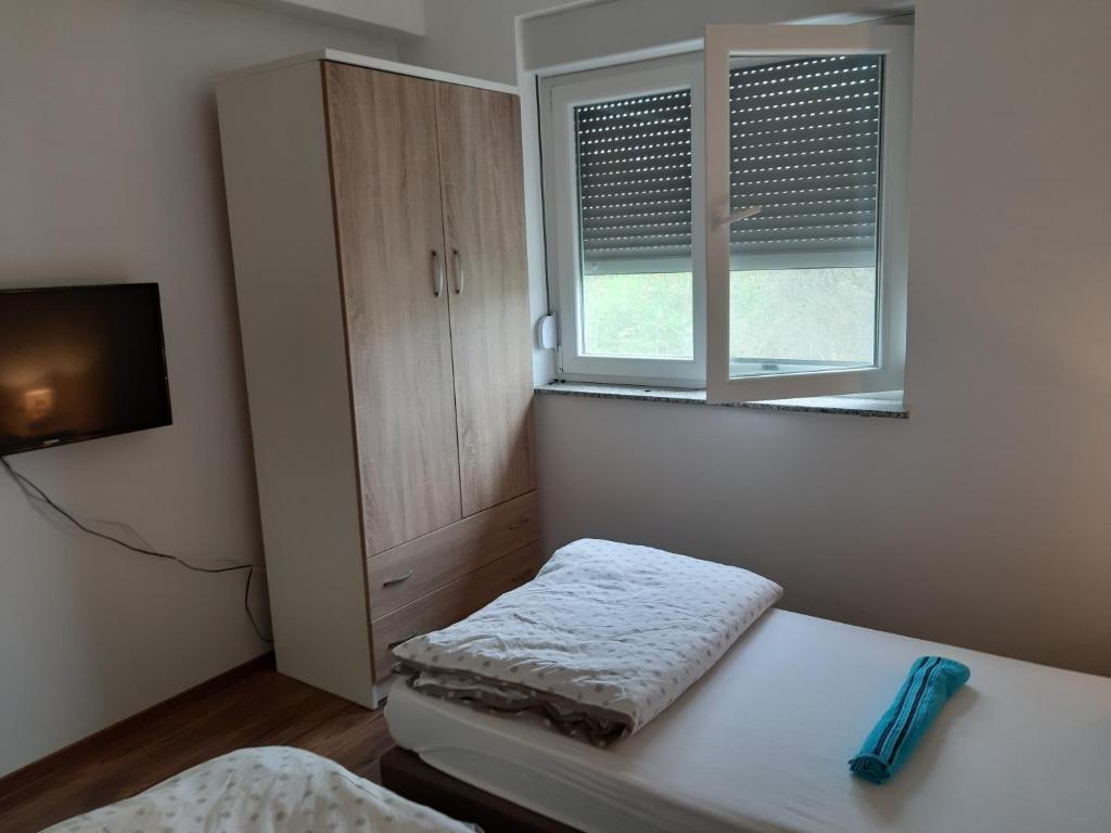 Postel nebo postele na pokoji v ubytování Villa Piccola