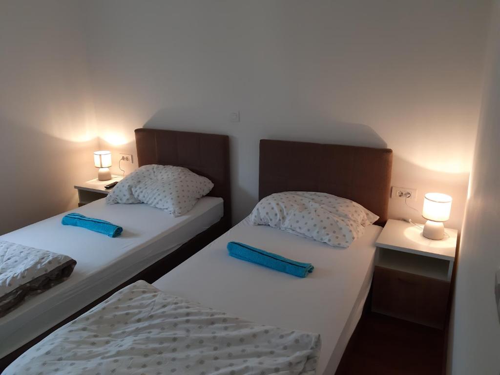 Postel nebo postele na pokoji v ubytování Villa Piccola