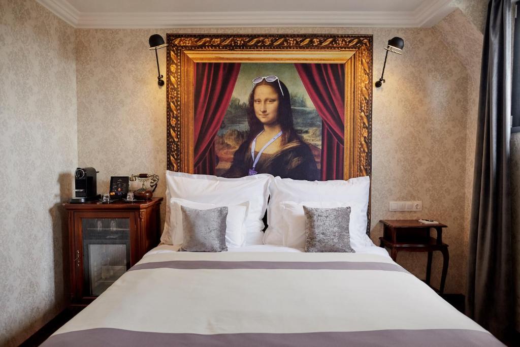 Säng eller sängar i ett rum på Mystery Hotel Budapest