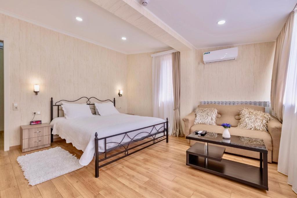 Postel nebo postele na pokoji v ubytování Q&B House