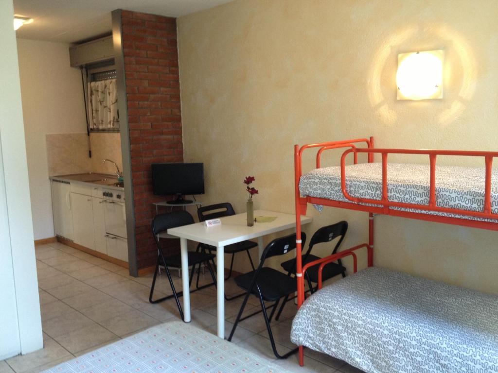 Postel nebo postele na pokoji v ubytování Residence Tell