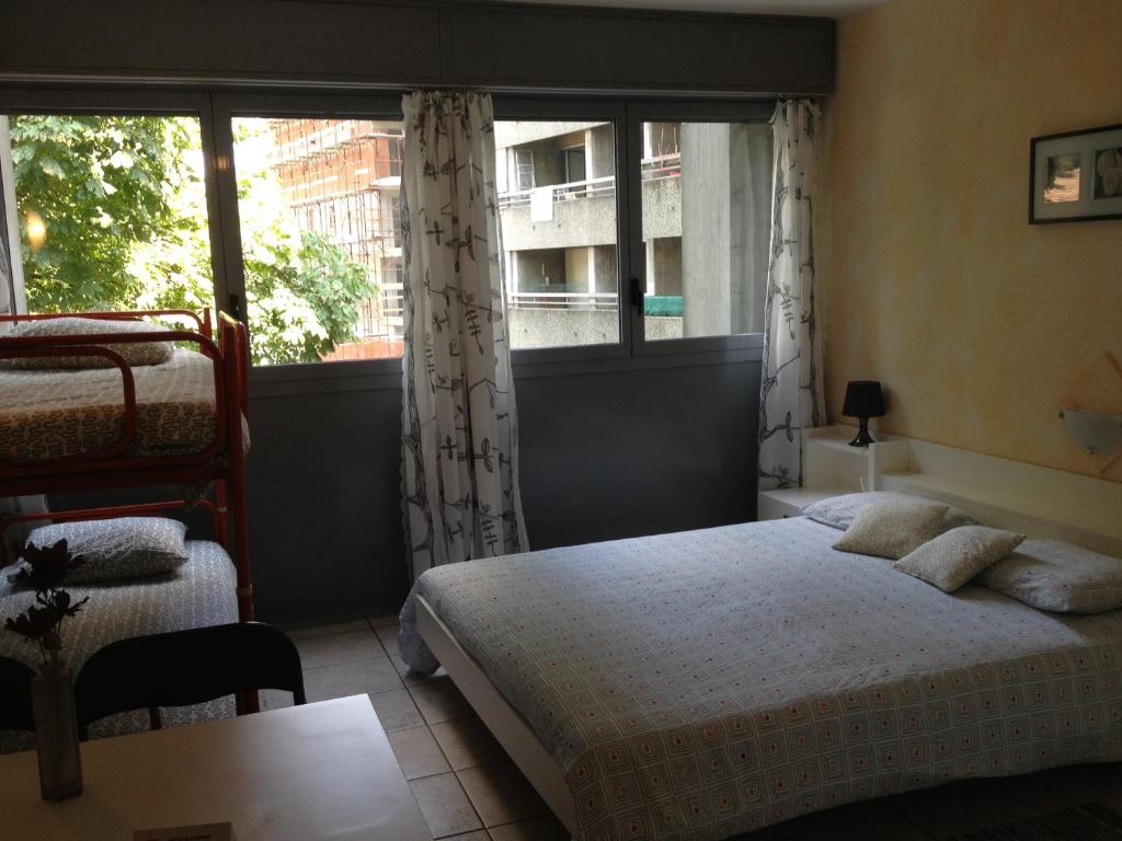 Postel nebo postele na pokoji v ubytování Residence Tell