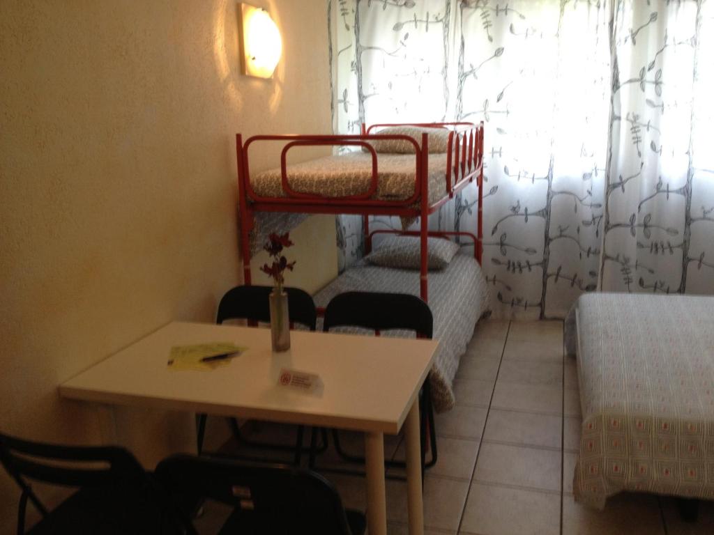 Postel nebo postele na pokoji v ubytování Residence Tell
