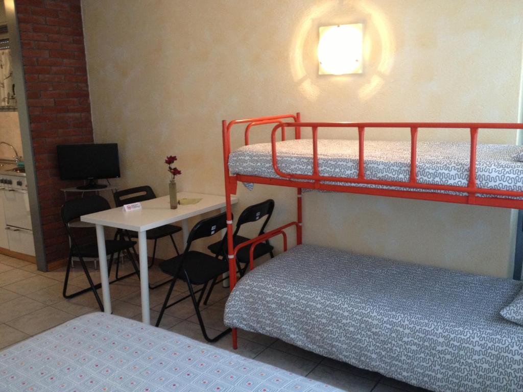 Postel nebo postele na pokoji v ubytování Residence Tell