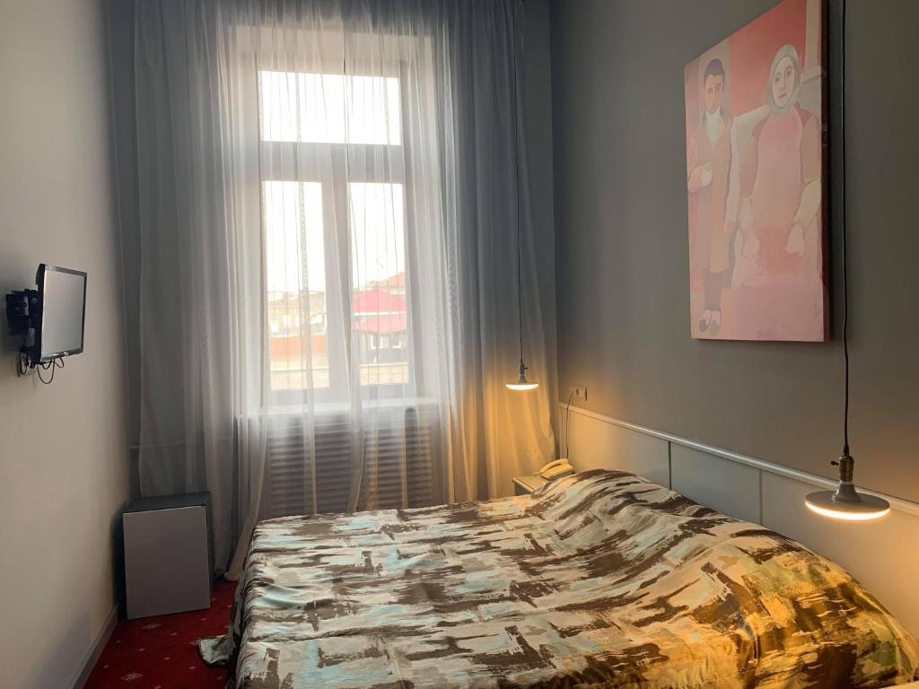 Postel nebo postele na pokoji v ubytování Araks Hotel Complex