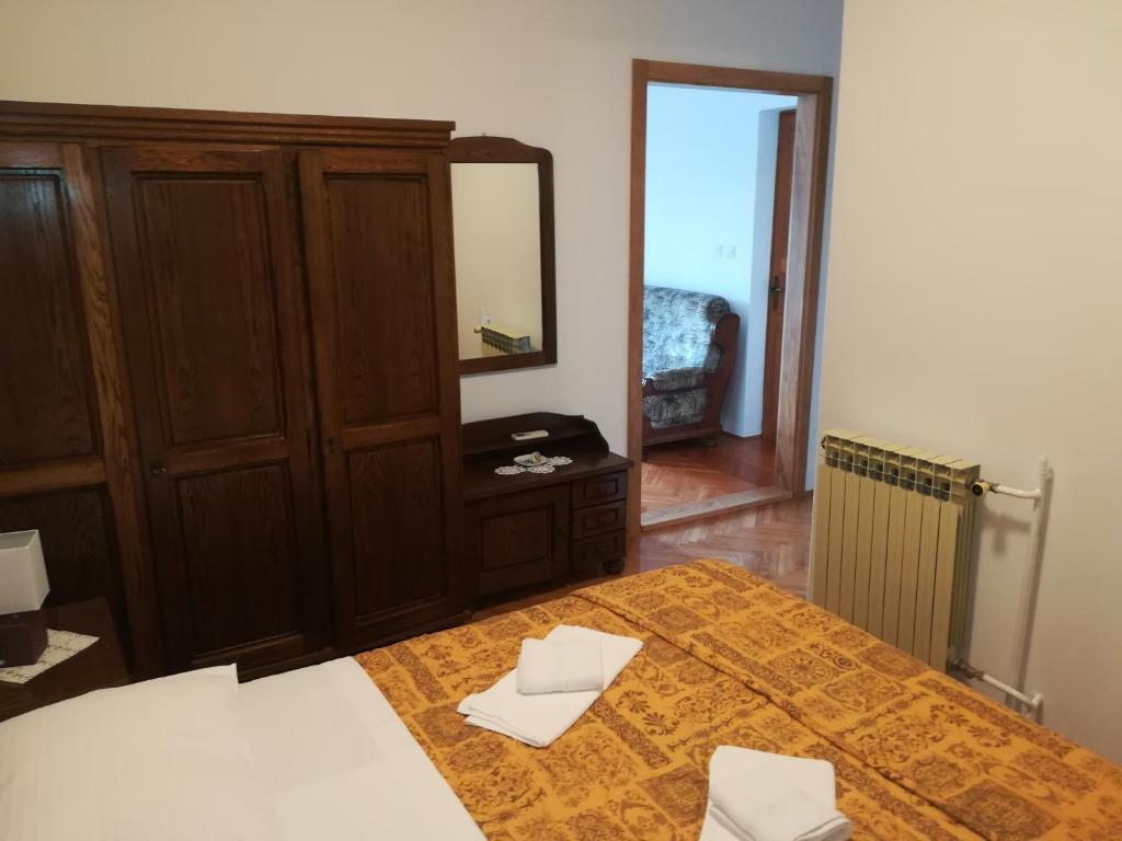 Een bed of bedden in een kamer bij Villa Kukuljica