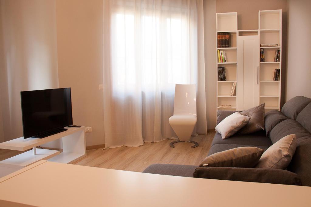 Televízia a/alebo spoločenská miestnosť v ubytovaní LG apartment