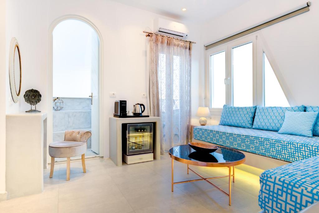 Posezení v ubytování Emerald Collection Suites