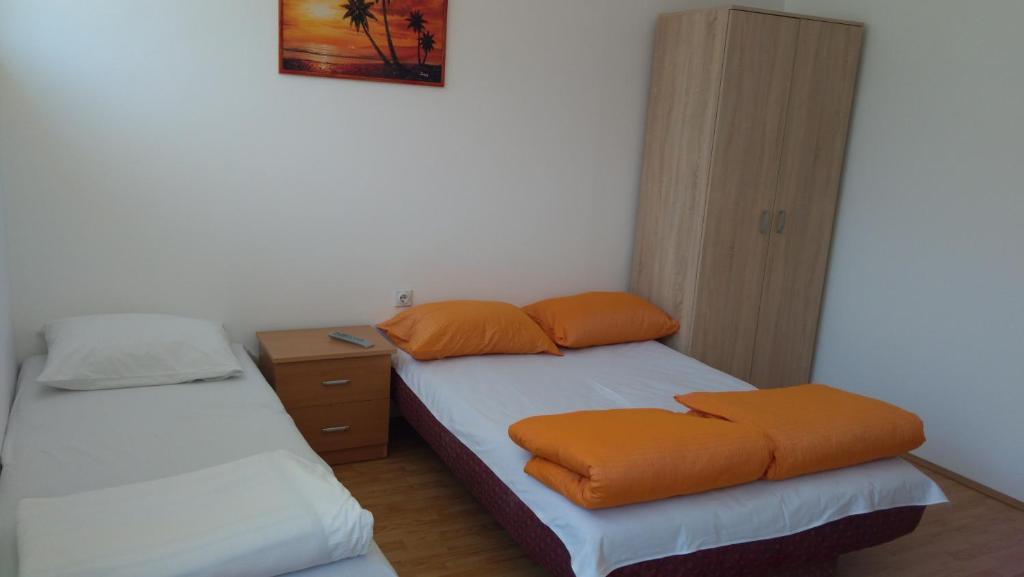 Vuode tai vuoteita majoituspaikassa Apartmani Milivojevic