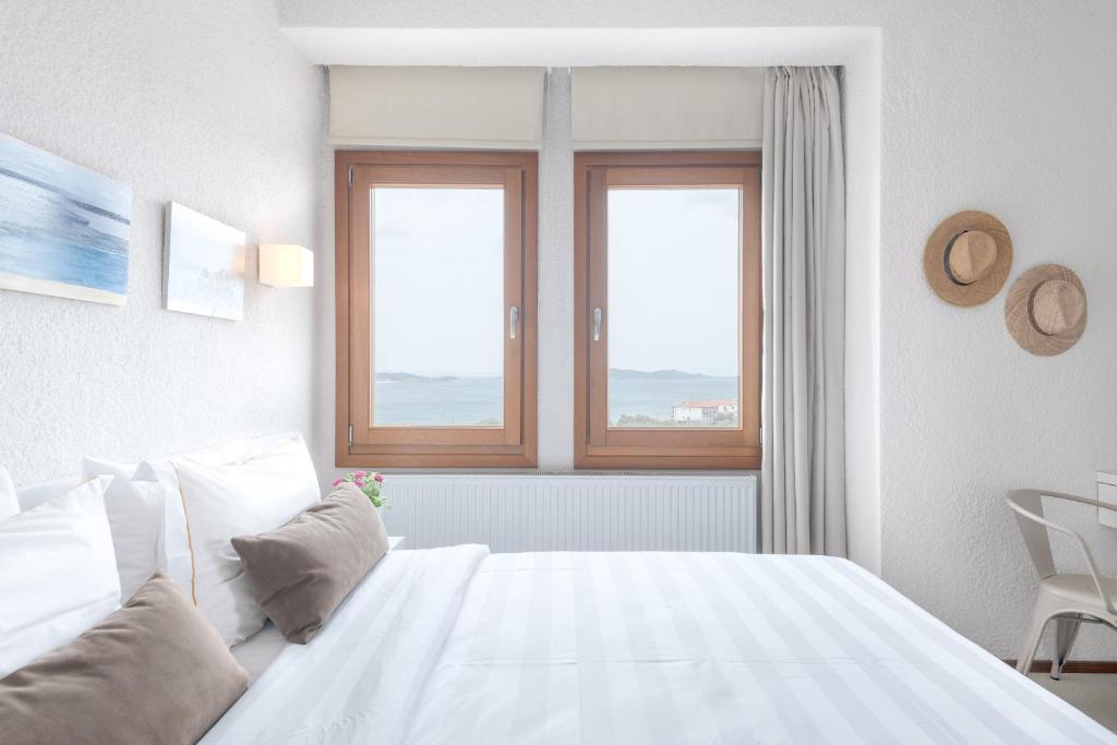 Postel nebo postele na pokoji v ubytování Villa Almira Luxury Apartments