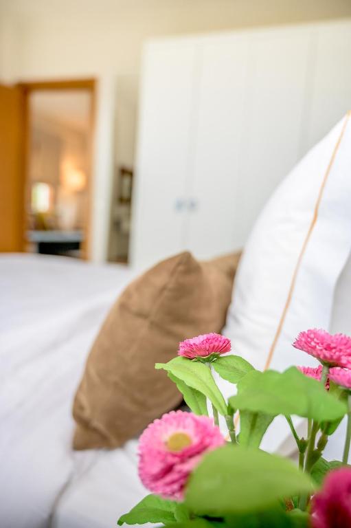 Postel nebo postele na pokoji v ubytování Villa Almira Luxury Apartments
