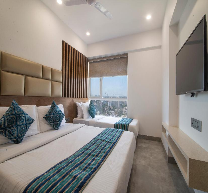 Postel nebo postele na pokoji v ubytování Hotel Wego