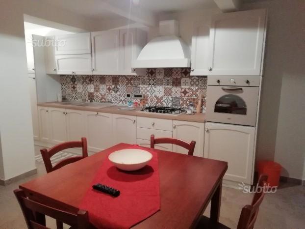 Kuchyň nebo kuchyňský kout v ubytování B&B Domus Palmi