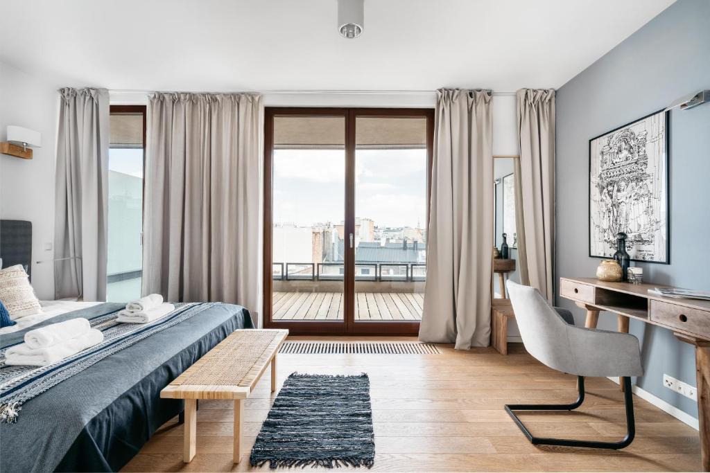 Posteľ alebo postele v izbe v ubytovaní Penthouse Uptown - LoftAffair