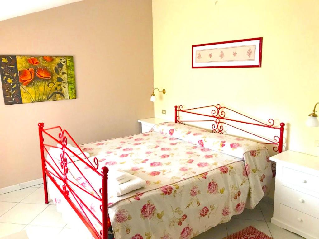 Postel nebo postele na pokoji v ubytování La brezza del Sud